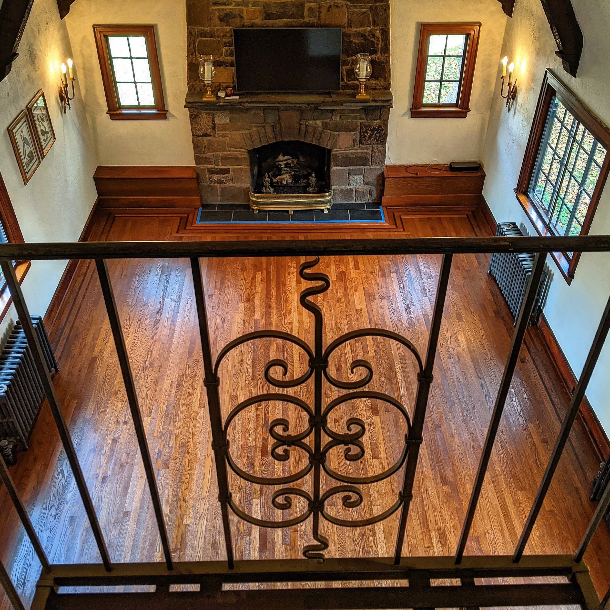 Image of brown, refinished wood floors from above