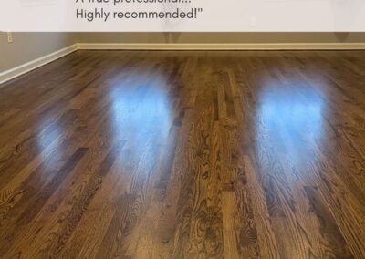 Image in of a newly refinished floor by JAK with a review praising the company: "The quality of their work is a tier above anyone else's... A true professional... Highly recommended!"