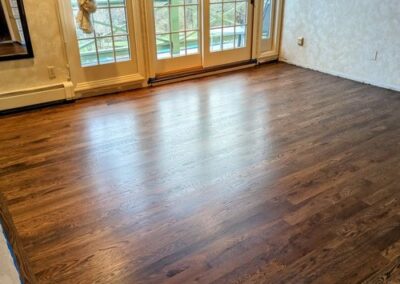 Image of medium brown refinished hard wood floors