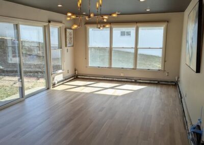 Photo of a floor refinished by JAK in natural tones