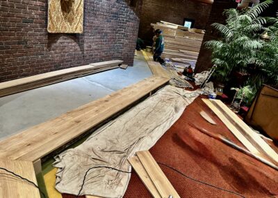 Wide plank European oak floor layout with mitered turns at the right side of the first altar platform at Saint Thomas More Church