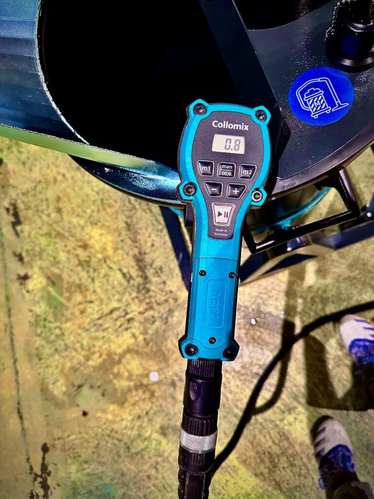 Collomix water dosing system feeding precise water into self-leveling mixer